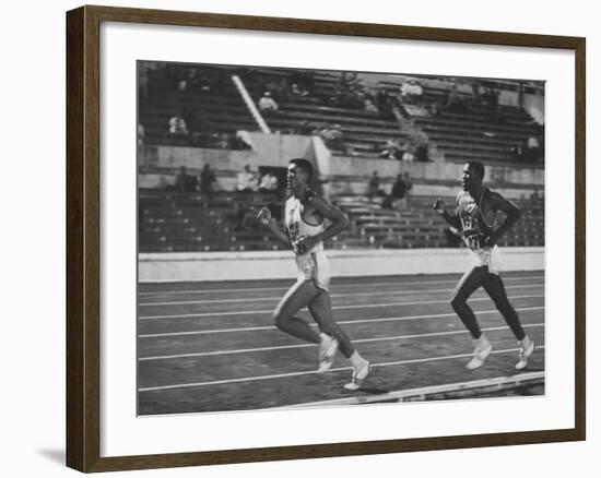 US Rafer Johnson and Nat. China Yang Chuan Kwang During Running Event at Olympics-null-Framed Premium Photographic Print