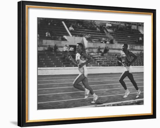 US Rafer Johnson and Nat. China Yang Chuan Kwang During Running Event at Olympics-null-Framed Premium Photographic Print