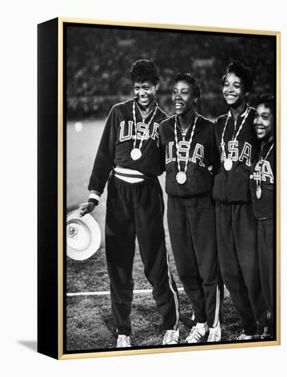 US Relay Team, Wilma Rudolph and Martha Hudson at Olympics-George Silk-Framed Premier Image Canvas