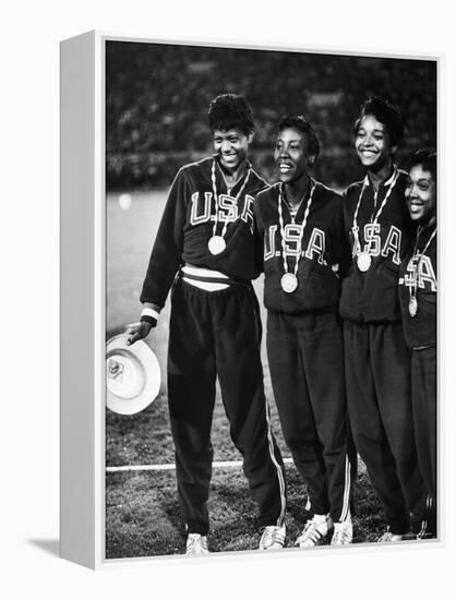 US Relay Team, Wilma Rudolph and Martha Hudson at Olympics-George Silk-Framed Premier Image Canvas