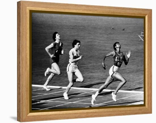 US Runner Wilma Rudolph Winning Women's 100 Meter Race at Olympics-Mark Kauffman-Framed Premier Image Canvas