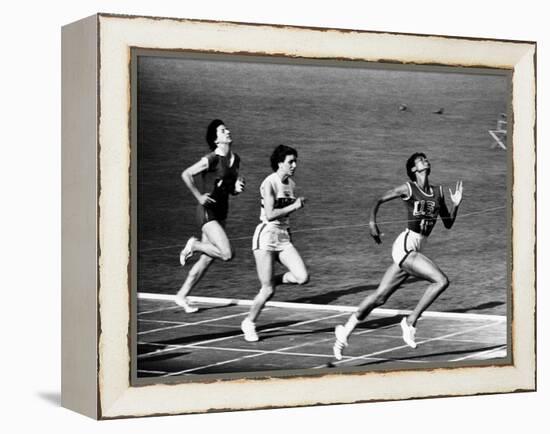 US Runner Wilma Rudolph Winning Women's 100 Meter Race at Olympics-Mark Kauffman-Framed Premier Image Canvas