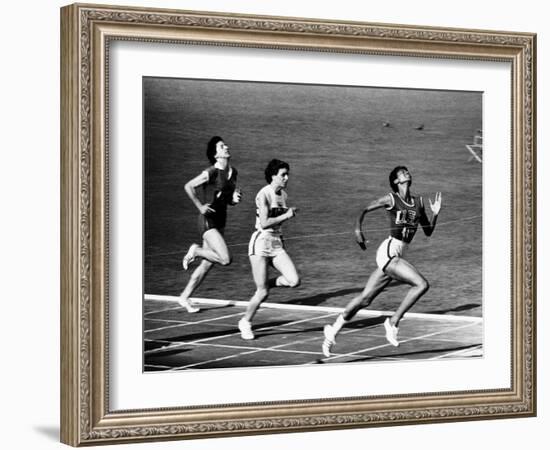 US Runner Wilma Rudolph Winning Women's 100 Meter Race at Olympics-Mark Kauffman-Framed Premium Photographic Print