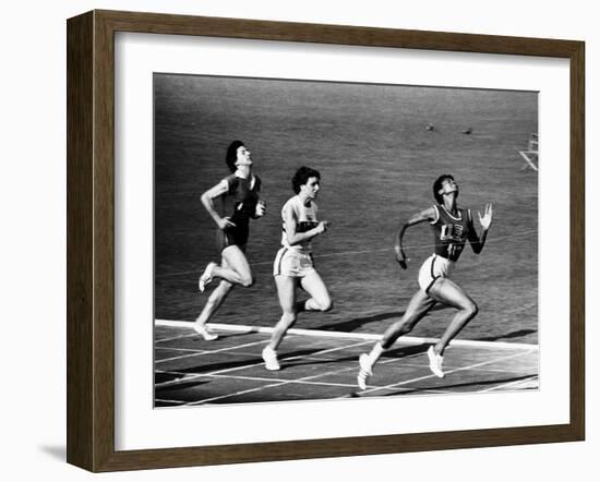 US Runner Wilma Rudolph Winning Women's 100 Meter Race at Olympics-Mark Kauffman-Framed Premium Photographic Print