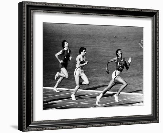 US Runner Wilma Rudolph Winning Women's 100 Meter Race at Olympics-Mark Kauffman-Framed Premium Photographic Print