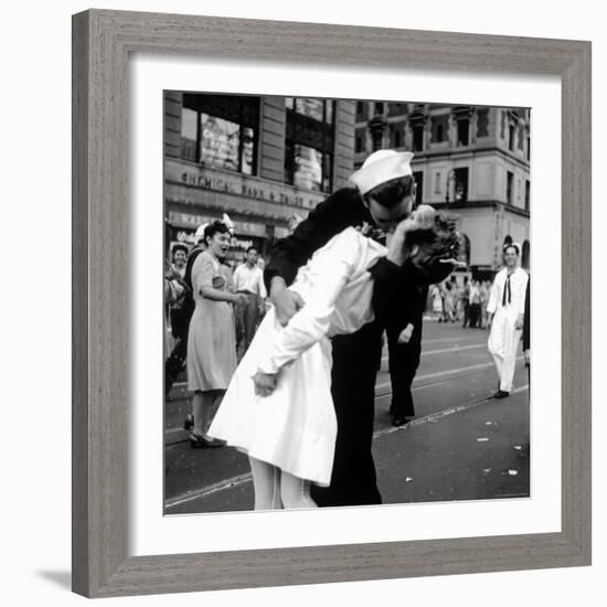 US Sailor Bending Young Nurse over His Arm to Give Her Passionate Kiss in Middle of Times Square-Victor Jorgensen-Framed Photographic Print