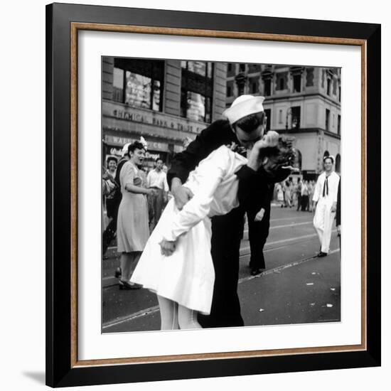 US Sailor Bending Young Nurse over His Arm to Give Her Passionate Kiss in Middle of Times Square-Victor Jorgensen-Framed Photographic Print