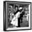 US Sailor Bending Young Nurse over His Arm to Give Her Passionate Kiss in Middle of Times Square-Victor Jorgensen-Framed Photographic Print