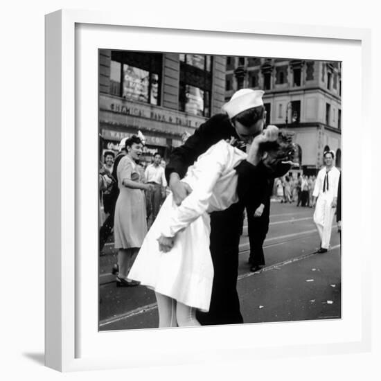 US Sailor Bending Young Nurse over His Arm to Give Her Passionate Kiss in Middle of Times Square-Victor Jorgensen-Framed Photographic Print