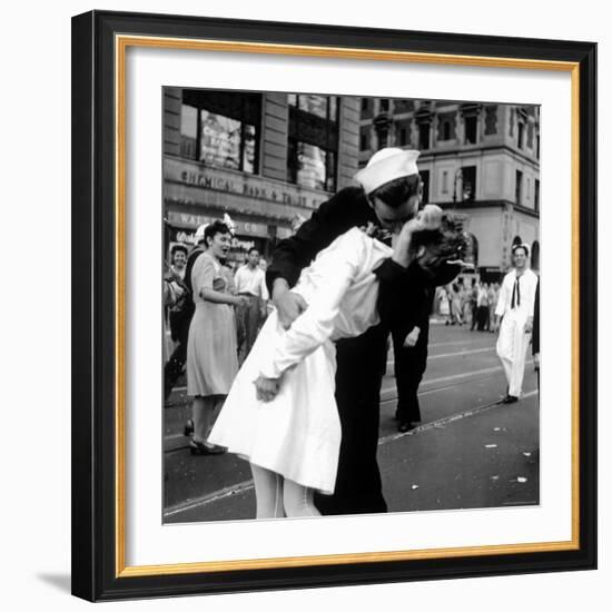 US Sailor Bending Young Nurse over His Arm to Give Her Passionate Kiss in Middle of Times Square-Victor Jorgensen-Framed Photographic Print