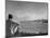 US Sailor Watching Navy Vessels on the Horizon-Carl Mydans-Mounted Photographic Print