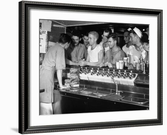 US Sailors Crowding around the Soda Fountain Aboard a Battleship-Carl Mydans-Framed Premium Photographic Print