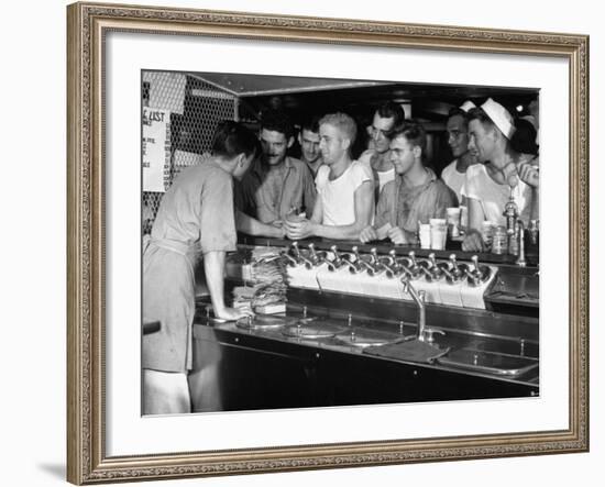 US Sailors Crowding around the Soda Fountain Aboard a Battleship-Carl Mydans-Framed Premium Photographic Print