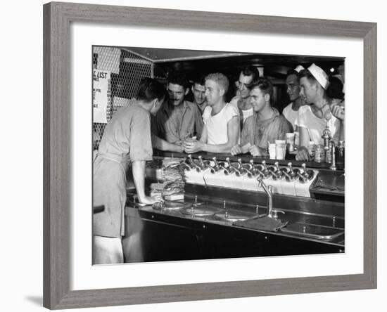 US Sailors Crowding around the Soda Fountain Aboard a Battleship-Carl Mydans-Framed Premium Photographic Print