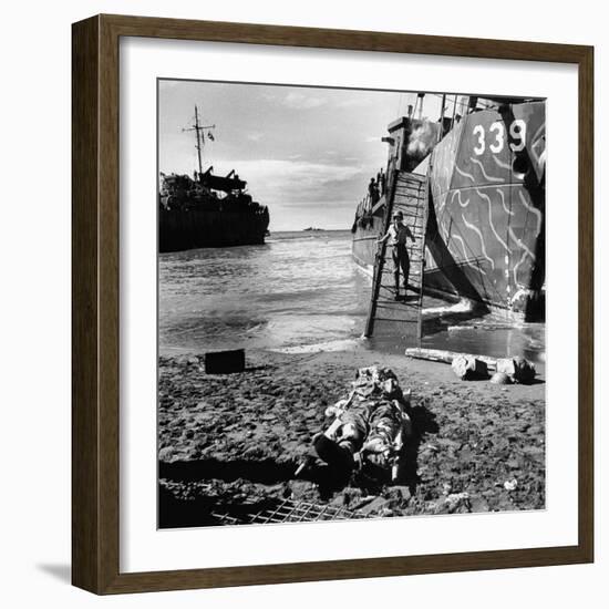 US Soldier Descending Towards Australian Serviceman Killed by Japanese Air Raid Attacks-Myron Davis-Framed Photographic Print