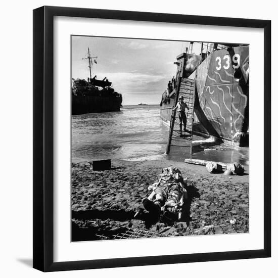 US Soldier Descending Towards Australian Serviceman Killed by Japanese Air Raid Attacks-Myron Davis-Framed Photographic Print