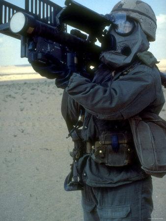 US Soldier Wearing MOPP-4 Anti Chemical Suit and Aiming Stinger Missile  Perched on Shoulder' Photographic Print | Art.com