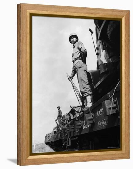 US Soldiers Standing Guard on a Troop Train-Myron Davis-Framed Premier Image Canvas