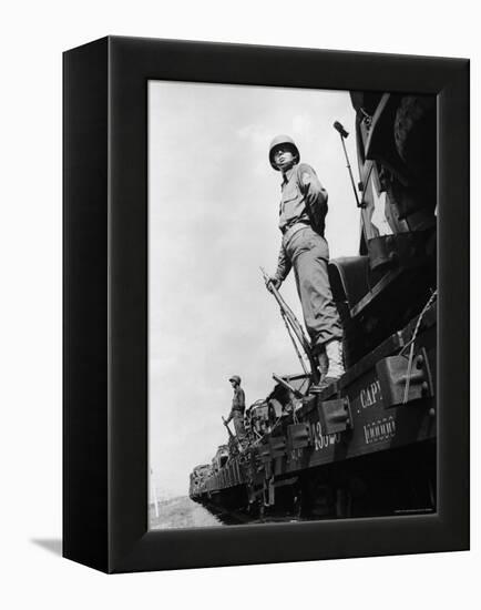 US Soldiers Standing Guard on a Troop Train-Myron Davis-Framed Premier Image Canvas