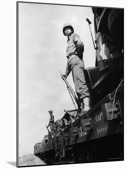 US Soldiers Standing Guard on a Troop Train-Myron Davis-Mounted Photographic Print