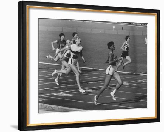 US Sprinter Wilma Rudolph During Women's 400-Meter Relay Race in Olympics-null-Framed Premium Photographic Print