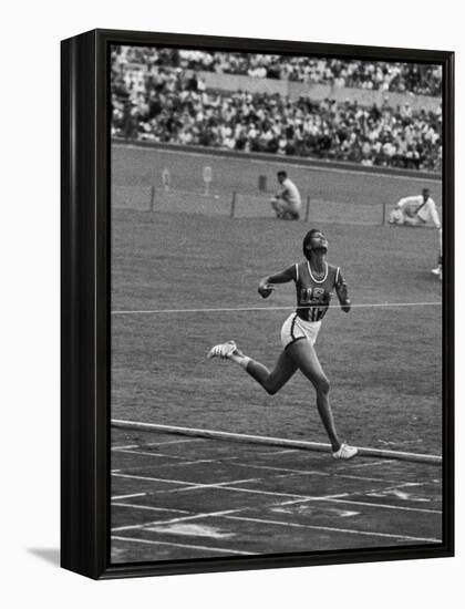 US Sprinter, Wilma Rudolph, Winning Women's 100 Meter Dash in Olympics-George Silk-Framed Premier Image Canvas