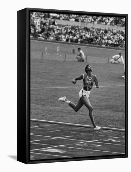 US Sprinter, Wilma Rudolph, Winning Women's 100 Meter Dash in Olympics-George Silk-Framed Premier Image Canvas