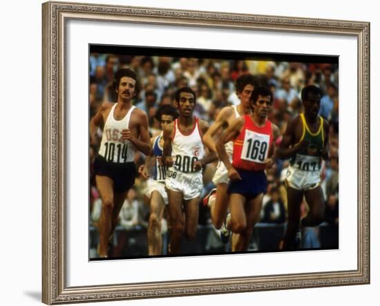 US Track Athlete Frank Shorter Running a Marathon at the Summer Olympics-John Dominis-Framed Premium Photographic Print