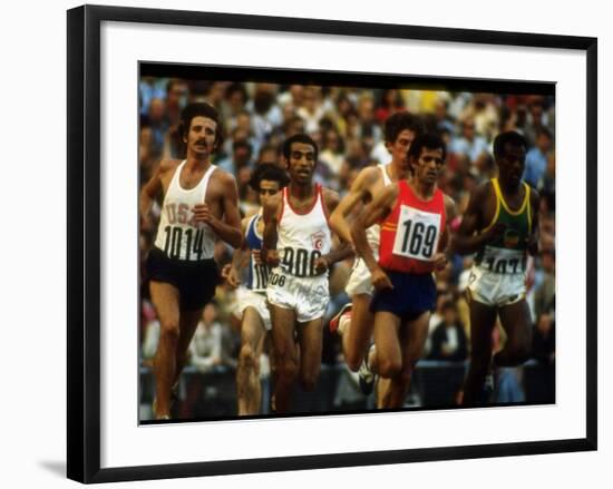 US Track Athlete Frank Shorter Running a Marathon at the Summer Olympics-John Dominis-Framed Premium Photographic Print