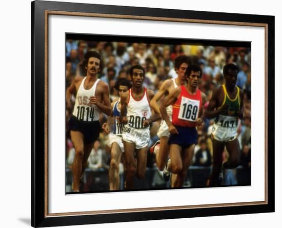 US Track Athlete Frank Shorter Running a Marathon at the Summer Olympics-John Dominis-Framed Premium Photographic Print