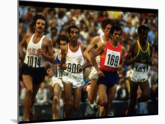 US Track Athlete Frank Shorter Running a Marathon at the Summer Olympics-John Dominis-Mounted Premium Photographic Print