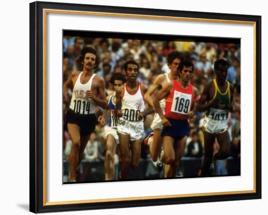 US Track Athlete Frank Shorter Running a Marathon at the Summer Olympics-John Dominis-Framed Premium Photographic Print