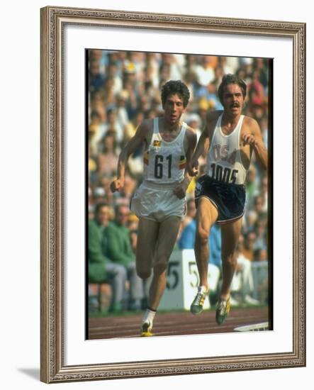 US Track Athlete Steve Prefontaine and Emiel Puttemans Running a Race at the Summer Olympics-null-Framed Premium Photographic Print