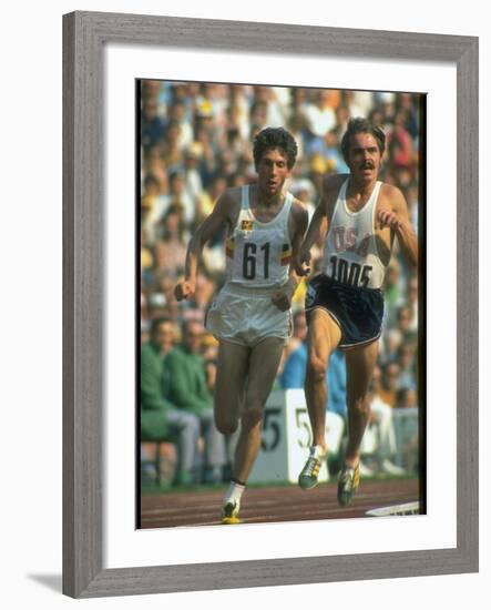 US Track Athlete Steve Prefontaine and Emiel Puttemans Running a Race at the Summer Olympics-null-Framed Premium Photographic Print