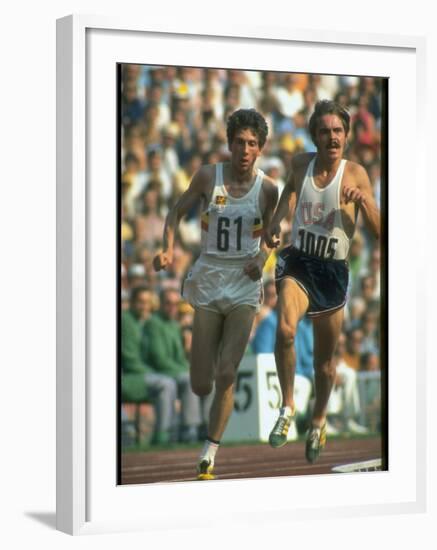 US Track Athlete Steve Prefontaine and Emiel Puttemans Running a Race at the Summer Olympics-null-Framed Premium Photographic Print