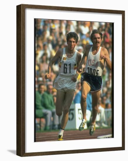 US Track Athlete Steve Prefontaine and Emiel Puttemans Running a Race at the Summer Olympics-null-Framed Premium Photographic Print