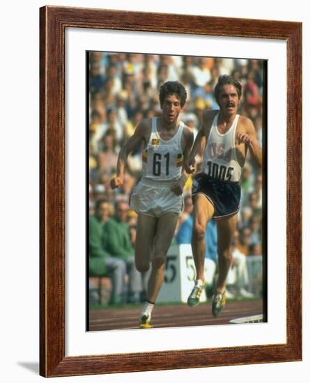 US Track Athlete Steve Prefontaine and Emiel Puttemans Running a Race at the Summer Olympics-null-Framed Premium Photographic Print