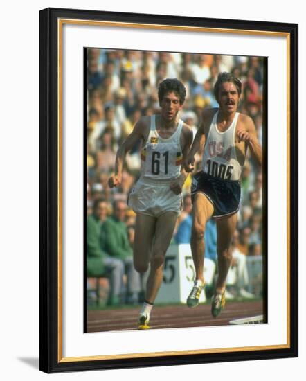 US Track Athlete Steve Prefontaine and Emiel Puttemans Running a Race at the Summer Olympics-null-Framed Premium Photographic Print