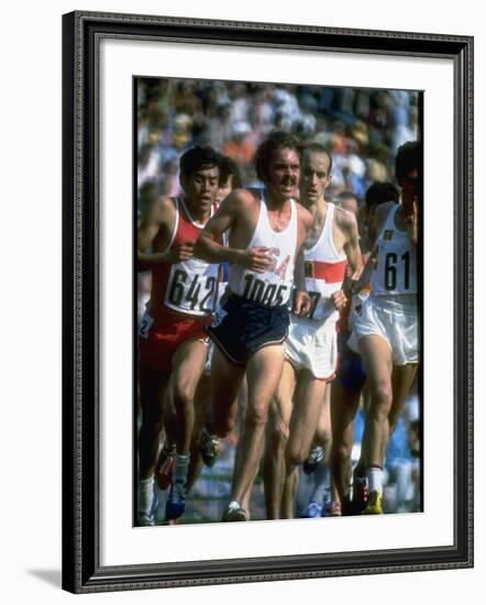 US Track Athlete Steve Prefontaine Running a Race at the Summer Olympics-null-Framed Premium Photographic Print