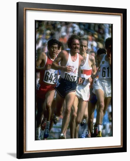 US Track Athlete Steve Prefontaine Running a Race at the Summer Olympics-null-Framed Premium Photographic Print