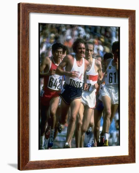 US Track Athlete Steve Prefontaine Running a Race at the Summer Olympics-null-Framed Premium Photographic Print