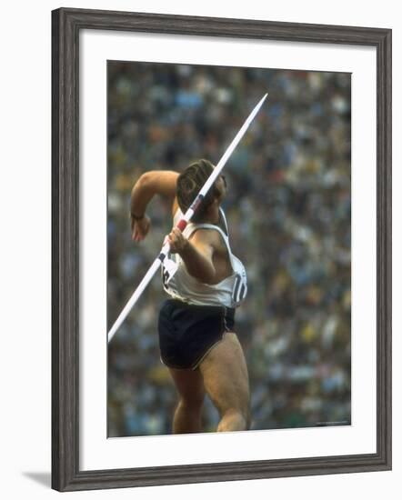 US Track Athlete William Schmidt Throwing Javelin at the Summer Olympics-John Dominis-Framed Premium Photographic Print