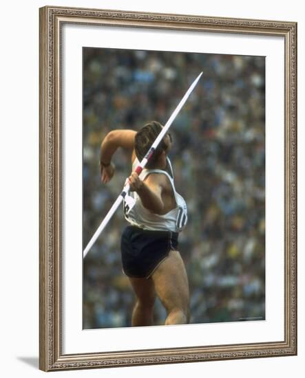 US Track Athlete William Schmidt Throwing Javelin at the Summer Olympics-John Dominis-Framed Premium Photographic Print