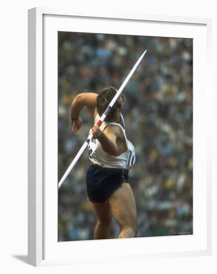 US Track Athlete William Schmidt Throwing Javelin at the Summer Olympics-John Dominis-Framed Premium Photographic Print