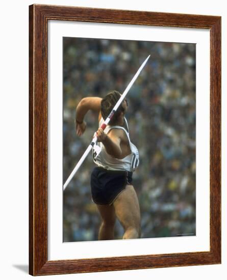 US Track Athlete William Schmidt Throwing Javelin at the Summer Olympics-John Dominis-Framed Premium Photographic Print