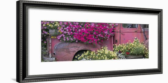 USA, Alaska, Chena Hot Springs. Panorama of old truck and flowers.-Jaynes Gallery-Framed Photographic Print