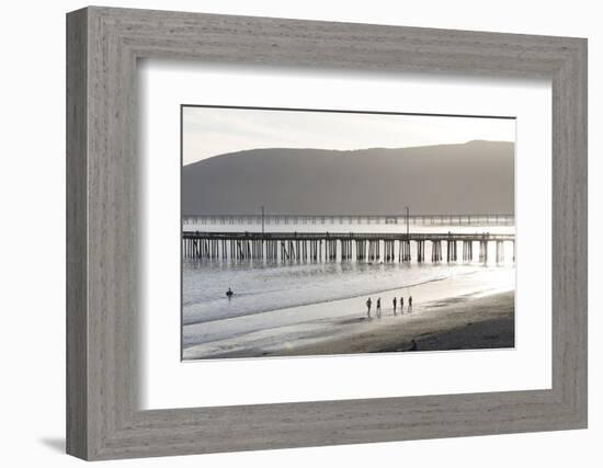 USA, California, Avila Beach. Silhouetted Beach Walkers Approach Pier End of Day-Trish Drury-Framed Photographic Print