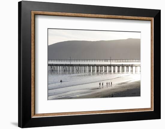 USA, California, Avila Beach. Silhouetted Beach Walkers Approach Pier End of Day-Trish Drury-Framed Photographic Print