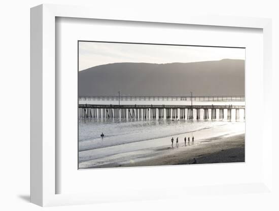 USA, California, Avila Beach. Silhouetted Beach Walkers Approach Pier End of Day-Trish Drury-Framed Photographic Print