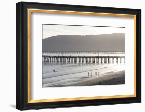 USA, California, Avila Beach. Silhouetted Beach Walkers Approach Pier End of Day-Trish Drury-Framed Photographic Print